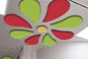 sound absorbing flower pattern in red, green and yellow on ceiling