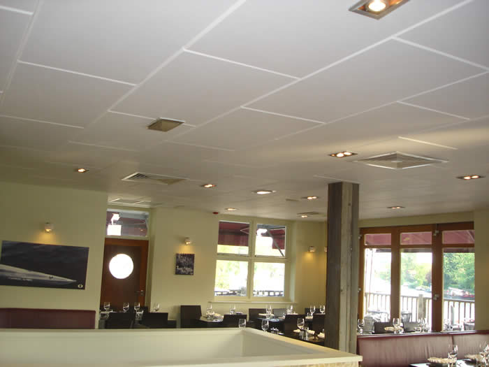 Echosorption Plus sound absorbing ceiling tiles installed on ceiling of a restaurant