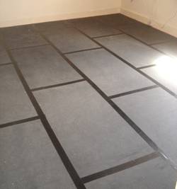 QuietFloor PLUS acoustic underlay installed onto a separating floor brick pattern