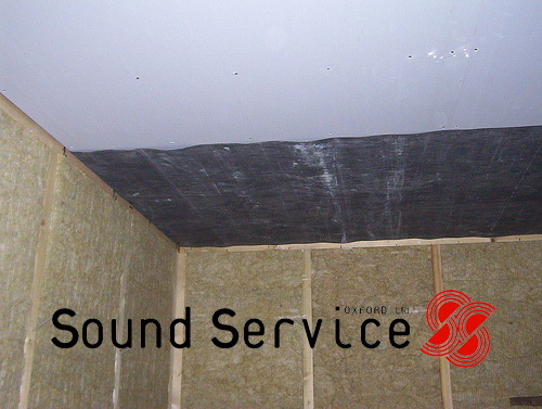 Acoustic Membrane fixed to ceiling and acoustic mineral wool in walls